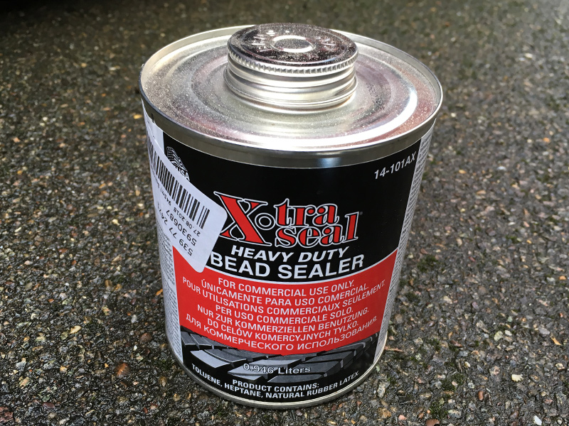A tin of bead sealer